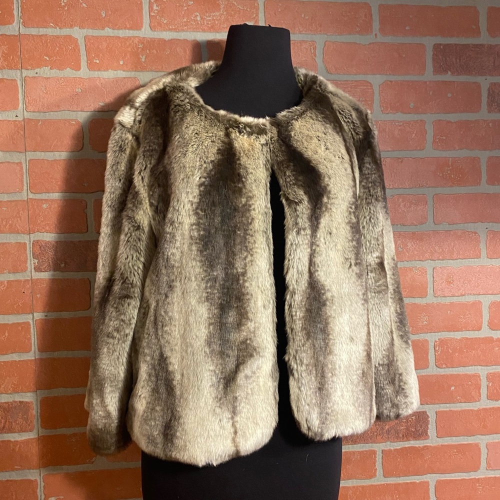 Size 14 Women’s faux fur coat.